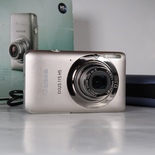 Canon IXUS 115 HS PowerShot ELPH 100 HS 12.1 MP 4x Digital Camera Silver