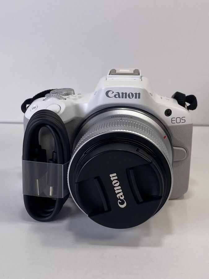 White Canon EOS R50 4K Video Mirrorless Camera with RF-S 18-45mm f/4.5-6.3